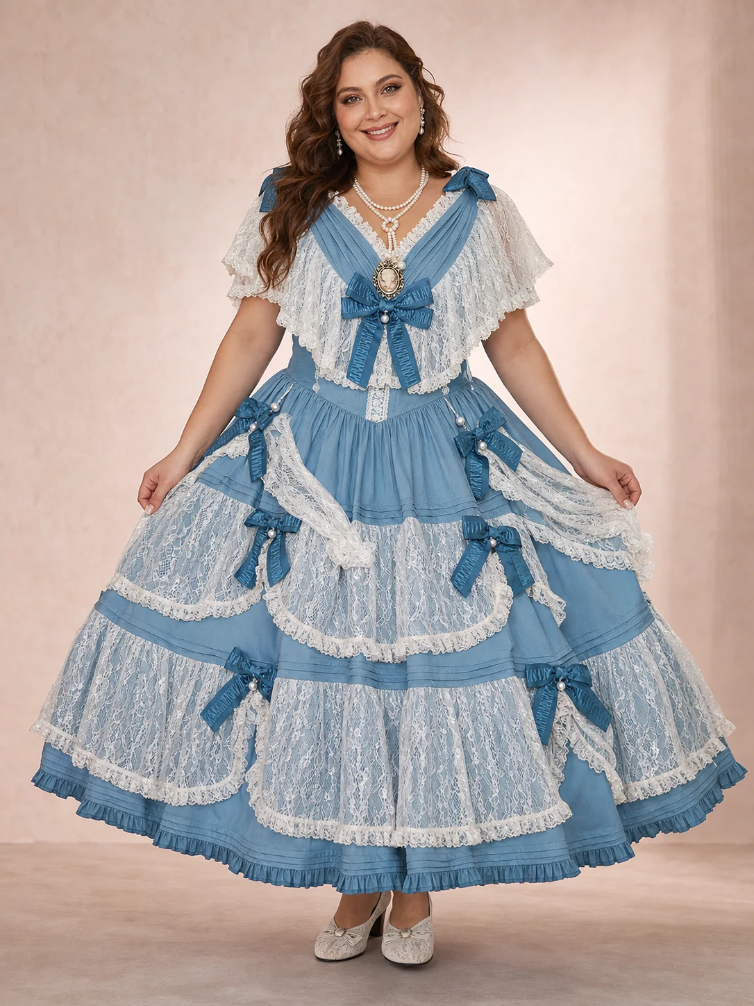 Plus-size model in dusty blue Antique Lace Classic Lolita JSK with white lace overlay, cameo, and bows